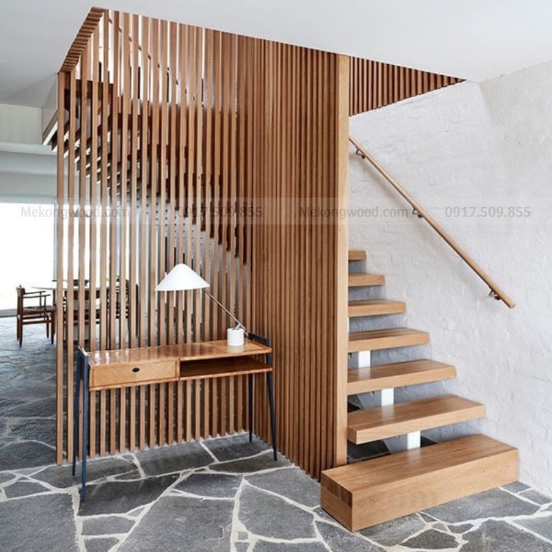 Hình ảnh vách ngăn cầu thang với sảnh được thiết kế tối giản và đơn điệu